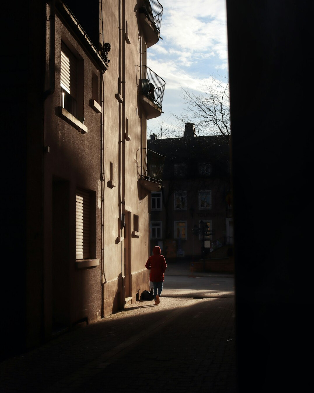 shadowy figure in alley